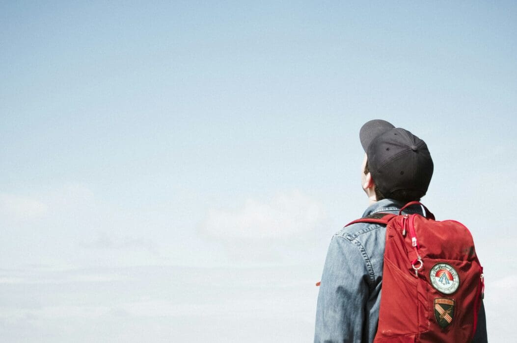 Person looking up at sky