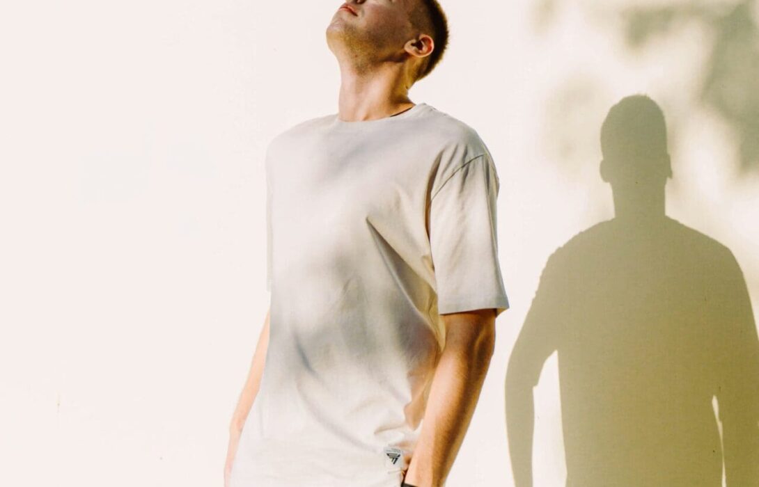 Man looking up white background